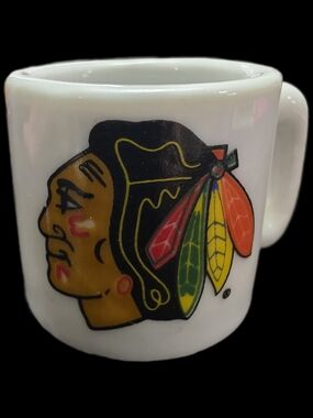 White Chicago Blackhawks mini ceramic mug featuring the classic team logo